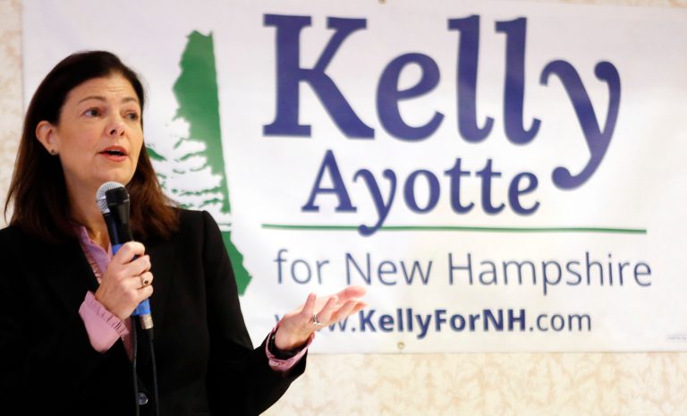 An event supporting Sen. Kelly Ayotte's re-election in New Hampshire featured a sign with big bold letters that read: 