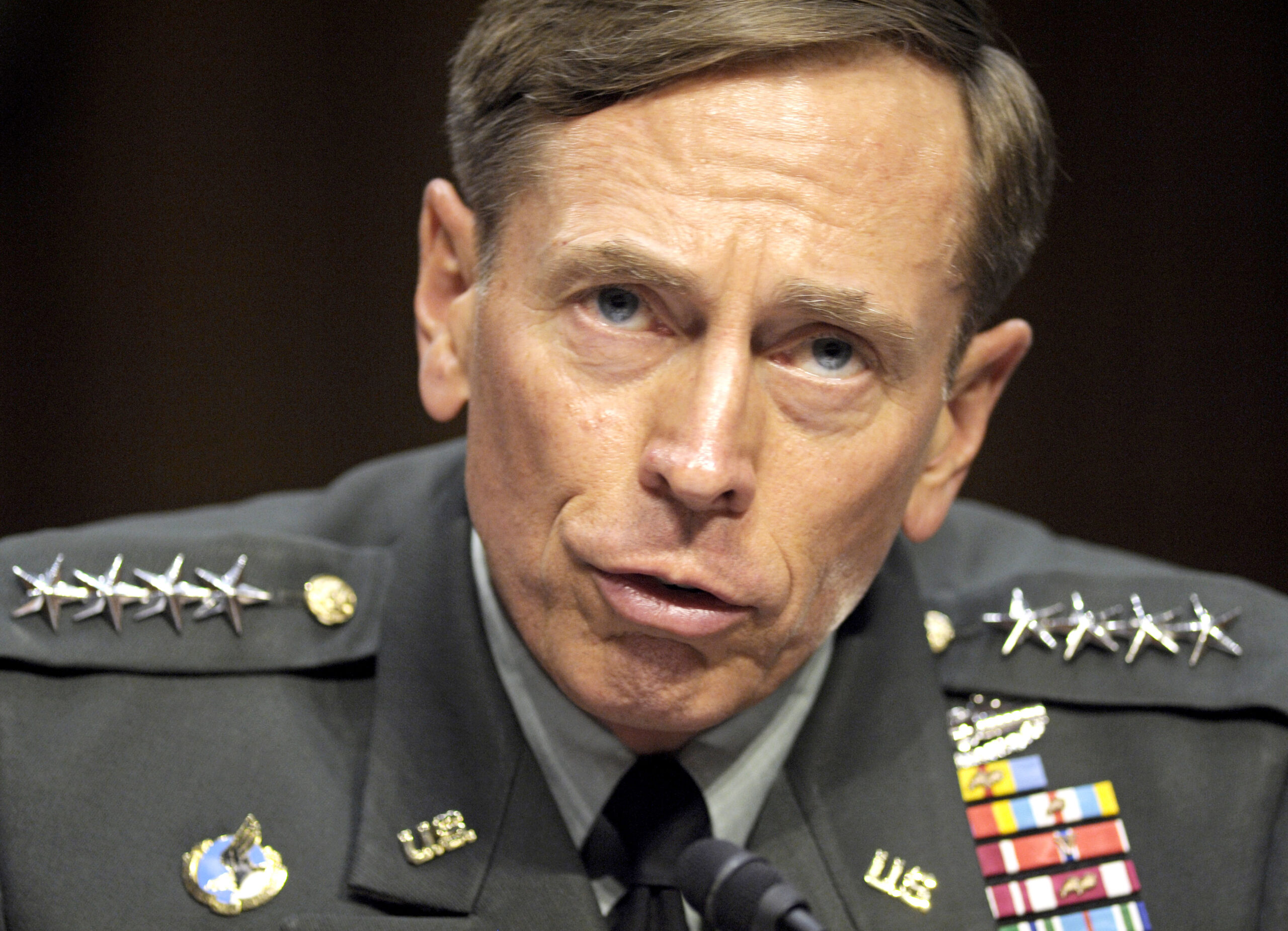 Defense secretary may demote retired Petraeus