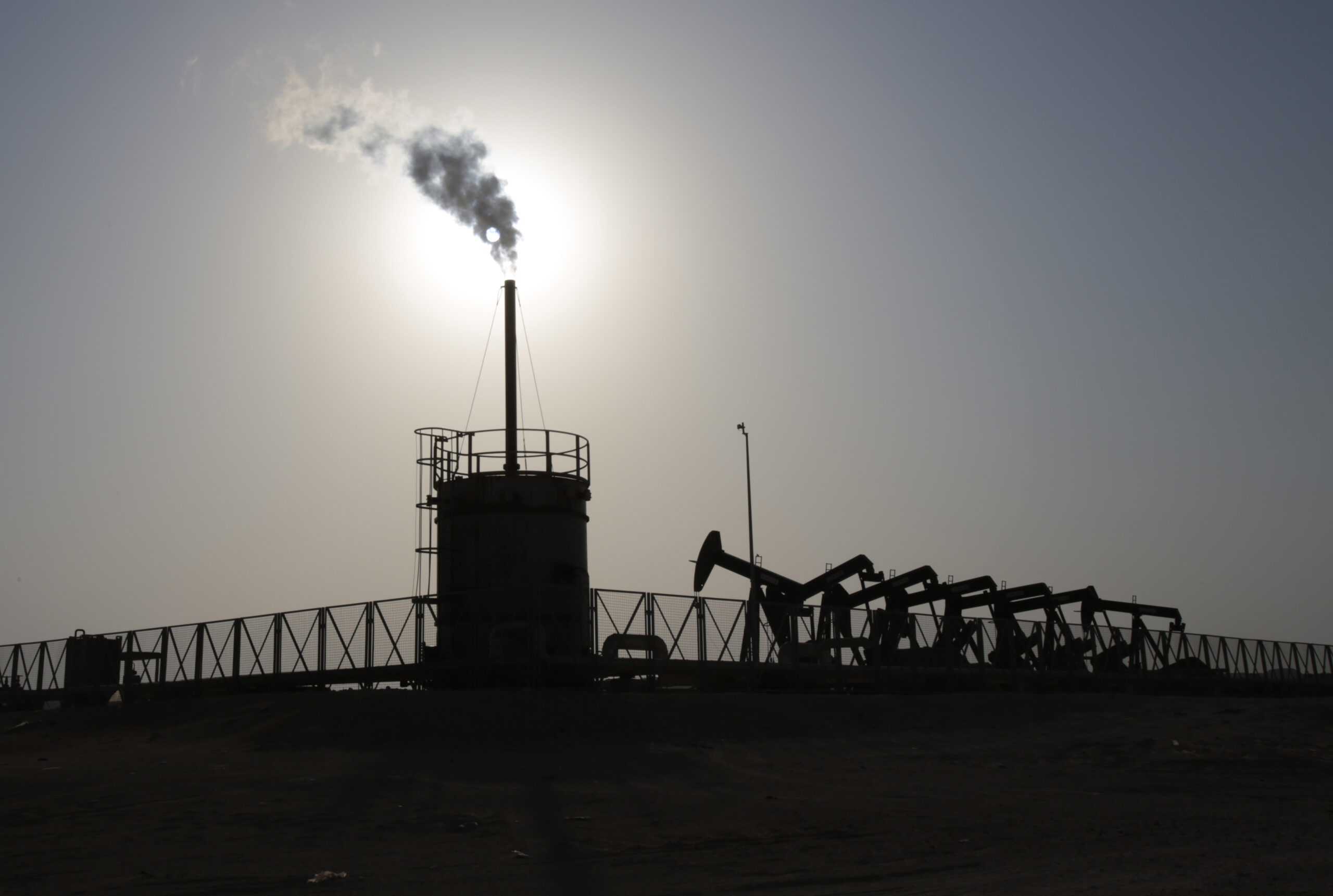 OPEC agrees to cut oil production, prices jump