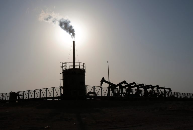 The cartel would cut output by about 750,000 barrels per day in a bid to raise prices. (AP Photo/Hasan Jamali)