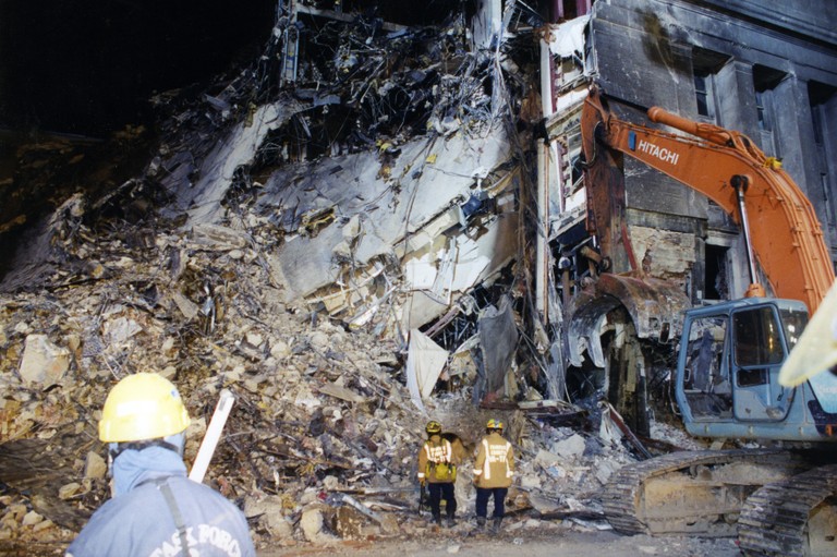 The photos also show the scale and damage done to the Pentagon by the jetliner as first responders beat back the blaze. (9/11 Attacks and Investigation Images)