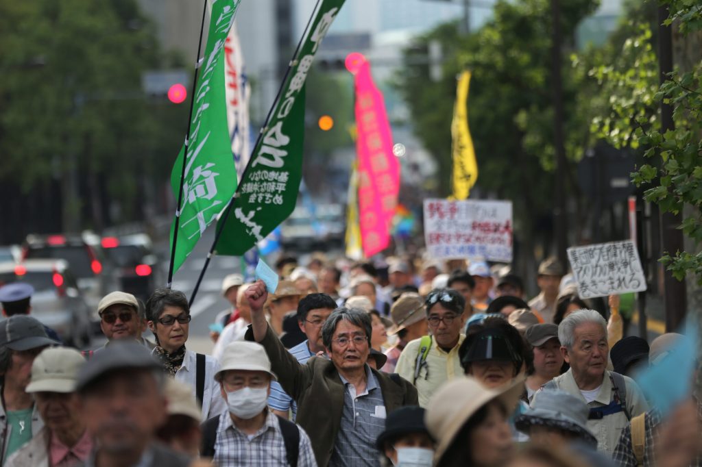 Japan split over revision to pacifist constitution