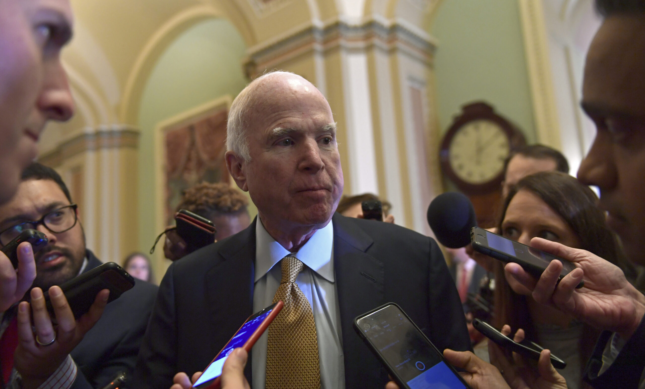 John McCain hits Trump for no mention of human rights in Vietnam