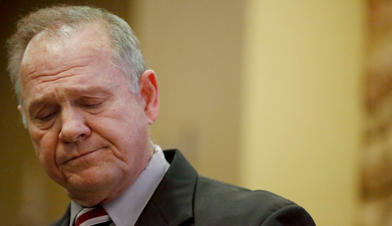 The RNC is also planning to cancel a field program of about a dozen paid canvassers working their way through Alabama for Moore. (AP Photo/Brynn Anderson)