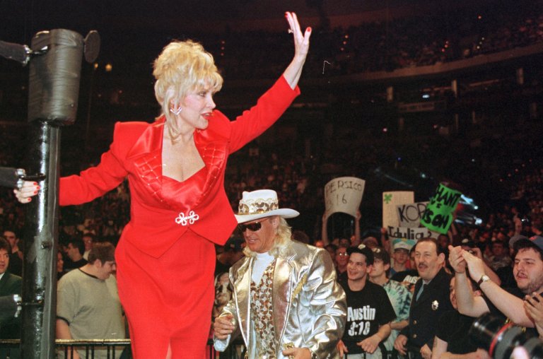 Gennifer Flowers enters the ring during Wrestlemania XIV in Boston Sunday, March 29, 1998. Flowers, alleged to have had a relationship with President Clinton, was scheduled to be a guest timekeeper.(AP Photo/Winslow Townson)