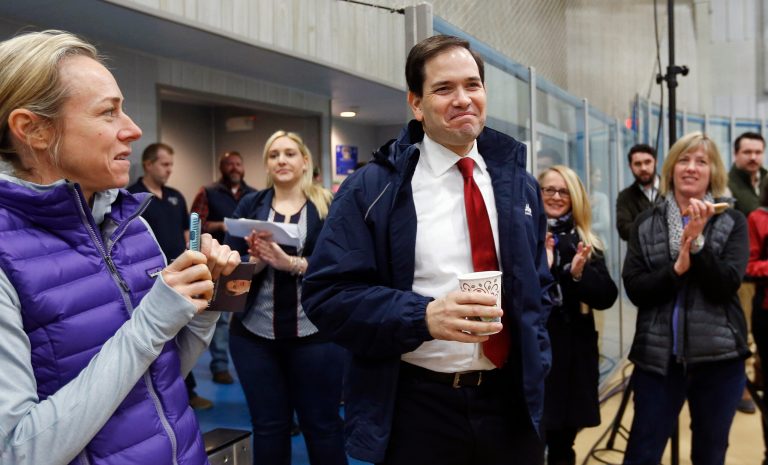 Duprey traveled alongside Romney during the 2012 election, and has previously with McCain and George W. Bush. (AP Photo/Jim Cole)