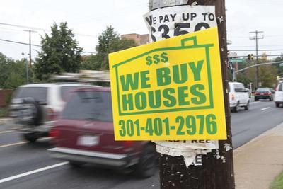 Companies must remove signs lining major roads under new Md. law
