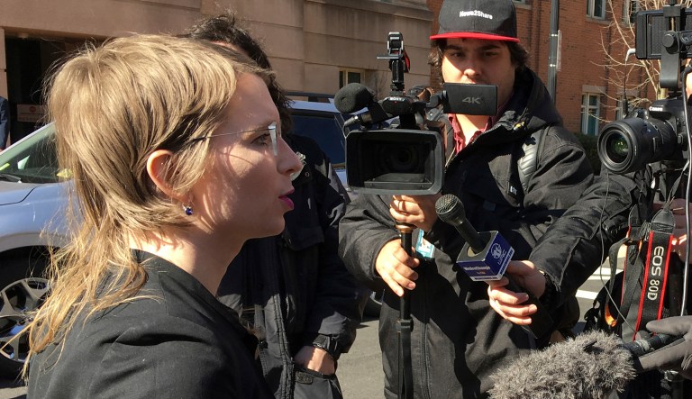 In this Tuesday, March 5, 2019 photo, Chelsea Manning addresses the media outside federal court in Alexandria, Va. The former Army intelligence analyst was ordered to jail Friday, March 8, 2019, for refusing to testify to a Virginia grand jury investigating Wikileaks.