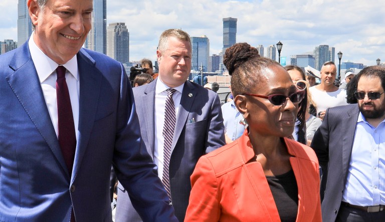 Mayor Bill de Blasio, second from left, and his wife Chirlane McCray, center, leaves after a press conference in lower Manhattan in New York Thursday May 16, 2019. Mayor de Blasio announced Thursday that he will seek the 2020 Democratic nomination for president.