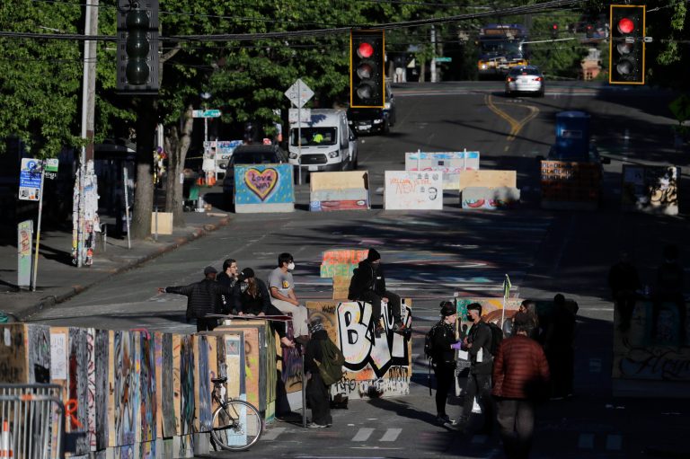Protesters block Seattle construction crew from removing CHOP barriers