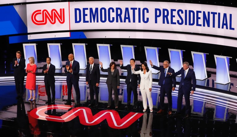 From left, Sen. Michael Bennet, D-Colo., Sen. Kirsten Gillibrand, D-N.Y., former Housing and Urban Development Secretary Julian Castro, Sen. Cory Booker, D-N.J., former Vice President Joe Biden, Sen. Kamala Harris, D-Calif., Andrew Yang, Rep. Tulsi Gabbard, D-Hawaii, Washington Gov. Jay Inslee and New York City Mayor Bill de Blasio.