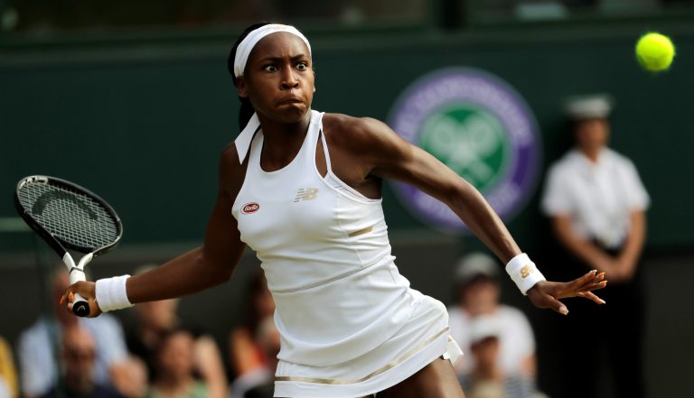 United States' Cori "Coco" Gauff returns to Slovenia's Polona Hercog in a Women's singles match during day five of the Wimbledon Tennis Championships in London, Friday, July 5, 2019.