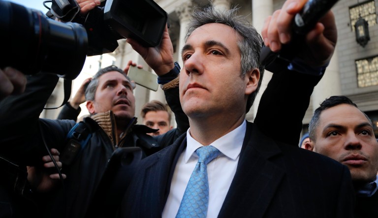 Michael Cohen walks out of federal court, Thursday, Nov. 29, 2018, in New York. Cohen, President Donald Trump's former lawyer,  pleaded guilty to lying to Congress about work he did on an aborted project to build a Trump Tower in Russia. He told the judge he lied about the timing of the negotiations and other details to be consistent with Trump's "political message."