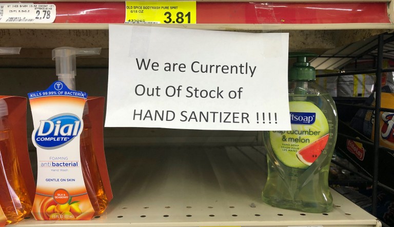 A sign hangs where Purell hand sanitizer would be at the Piggly Wiggly on North Avenue in Athens, Ga., Friday, March 13, 2020.