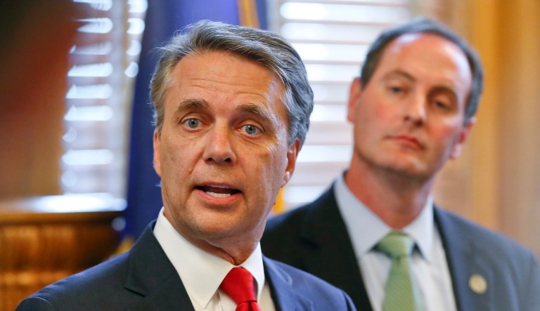 Kansas Gov. Jeff Colyer addresses the media at the Kansas Statehouse in Topeka, Kan., on Aug. 8, 2018.