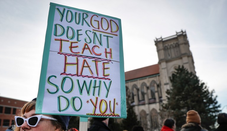 Protestors gather outside the Catholic Diocese of Covington Tuesday, Jan. 22, 2019, in Covington, Ky. The diocese in Kentucky has apologized after videos emerged showing students from Covington Catholic High School mocking Native Americans outside the Lincoln Memorial on Friday after a rally in Washington.