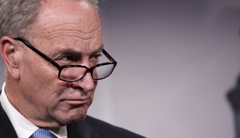 Sen. Charles Schumer, D-N.Y. listens during a news conference on Capitol Hill in Washington, Thursday, May 22, 2014, to discuss immigration reform. (AP Photo/Lauren Victoria Burke)