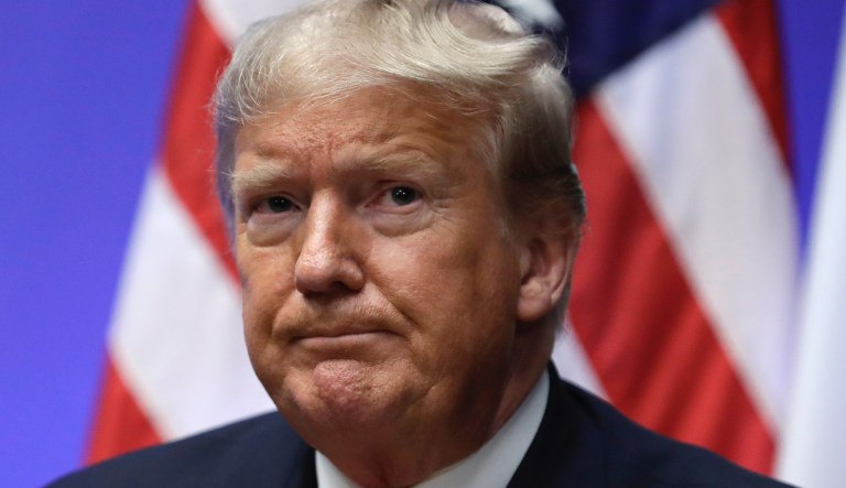 President Donald Trump listens as he meets with Italian Prime Minister Giuseppe Conte during the NATO summit at The Grove, Wednesday, Dec. 4, 2019, in Watford, England.