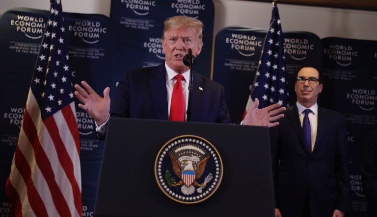 President Donald Trump and first lady Melania Trump look the the crowd as they leave an Independence Day celebration in front of the Lincoln Memorial, Thursday, July 4, 2019, in Washington. 