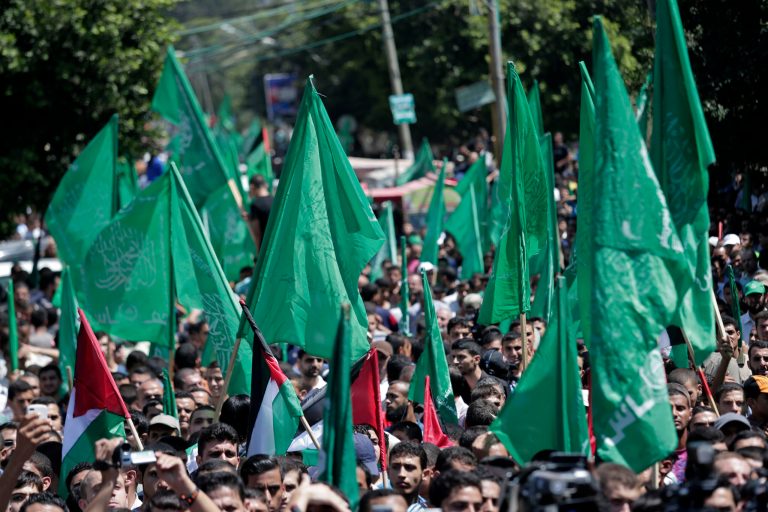 Palestinian Hamas supporters gather for a rally in Gaza City, Gaza Strip, Thursday, Aug. 7, 2014. Thursday's rally drew several thousand supporters and a senior Hamas official has told supporters at the rally that the war with Israel won't be over until the group's political demands are met. Israel and Hamas were holding indirect negotiations in Cairo, Egypt about new border arrangements for blockaded Gaza and extending a cease-fire. (AP Photo/Lefteris Pitarakis)