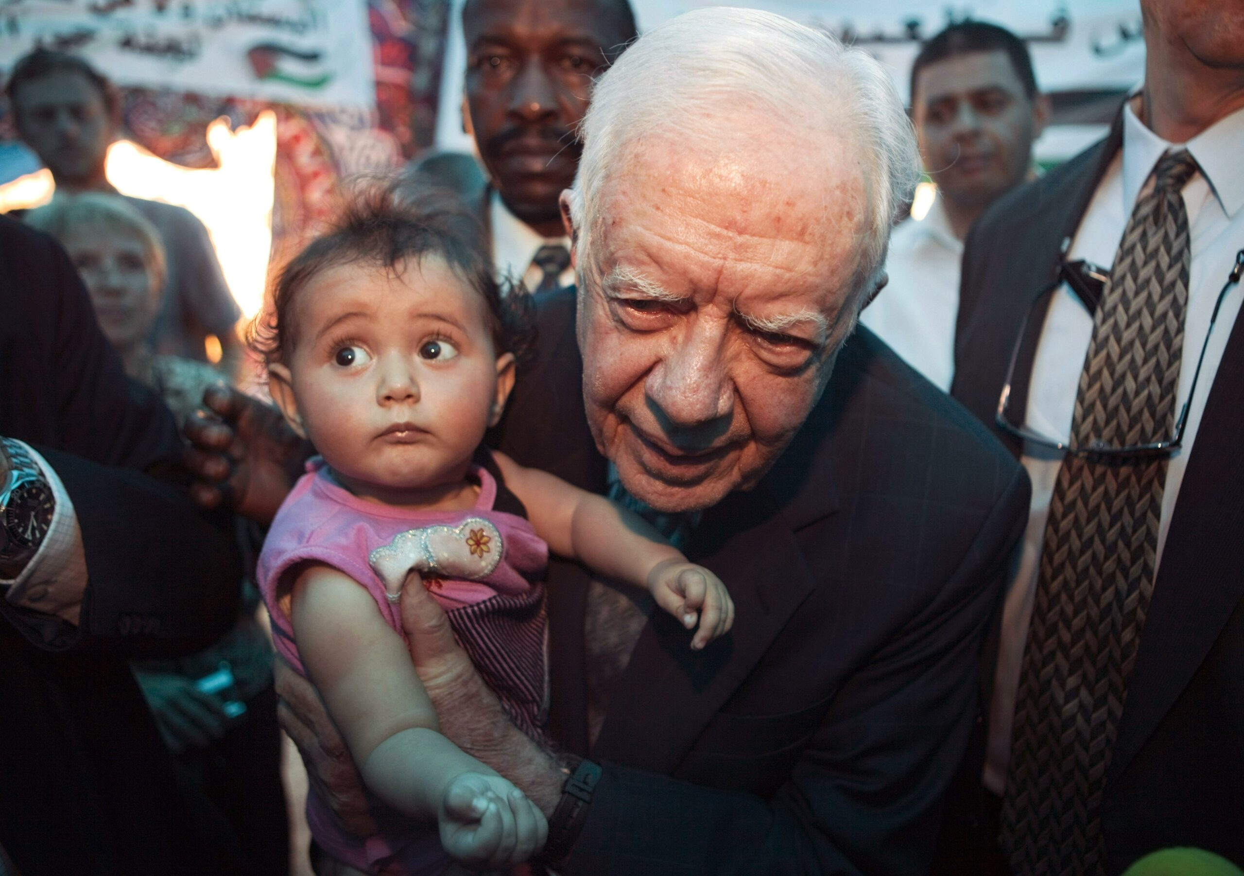 Carter, Democrats press Obama to junk abortion support