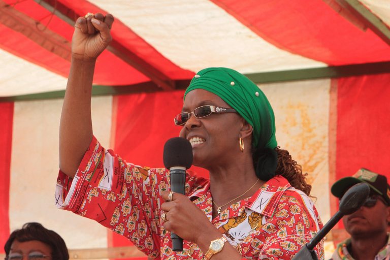 Zimbabwe's first lady Grace Mugabe addresses a rally in Chinhoyi, about 120 kilometres west of Harare, Thursday, Oct. 2, 2014. In her speech Mugabe castigated factionalism in the ruling Zanu PF party, as she embarked on her maiden political rally since been nominated to head the Zanu PF ruling party women's league in July. The rally held in the small farming town of Chinhoyi marked the vivacious 49-year-old's first steps to shore up her political credentials outside President Robert Mugabe's shadow .(AP Photo/Tsvangirayi Mukwazhi)