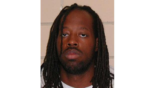 Fugitive held victim at gunpoint until debit card worked again
