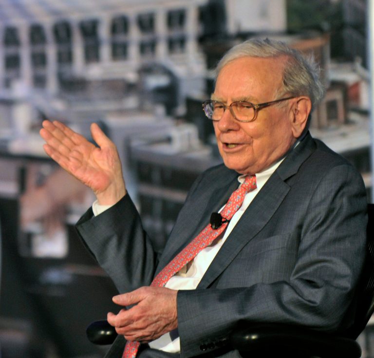 Warren Buffett speaks during the Goldman Sachs celebration ceremony of the first graduating class of the 10,000 Small Businesses at Wayne State University on Thursday, Sept. 18, 2014, in Detroit. The investment banking firm committed $20 million to Detroit and southeast Michigan to help small businesses create jobs and economic growth by providing entrepreneurs with a practical business education, access to capital and business support services. (AP Photo/Detroit News, Robin Buckson)  DETROIT FREE PRESS OUT; HUFFINGTON POST OUT