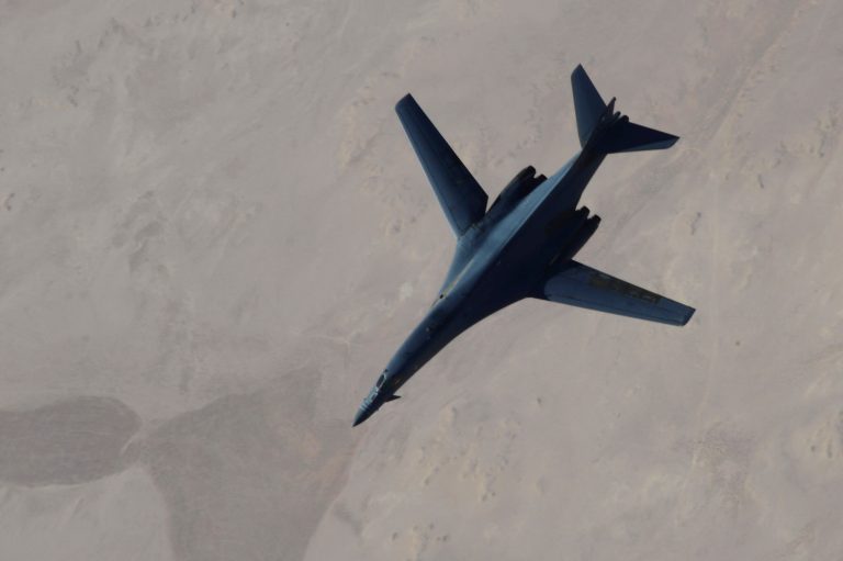 A B-1B Lancer disengages from a KC-135 Stratotanker after refueling during U.S.-led airstrikes on Islamic State group targets in Syria. (AP Photo/Staff Sgt. Ciara Wymbs, U.S. Air Force)