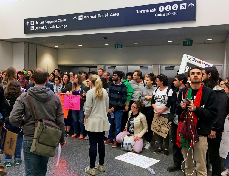 President Trump's immigration order caused more than 100,000 visas to be revoked, a government attorney revealed during a court hearing on Friday. (AP Photo/Olga Rodriguez)