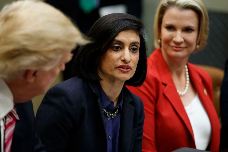 President Donald Trump , left, and Texas State Sen. Dawn Buckingham, right, listen as Administrator of the Centers for Medicare and Medicaid Services Seema Verma speaks during a meeting on women in healthcare, Wednesday, March 22, 2017, in the Roosevelt Room of the White House in Washington. (AP Photo/Evan Vucci)