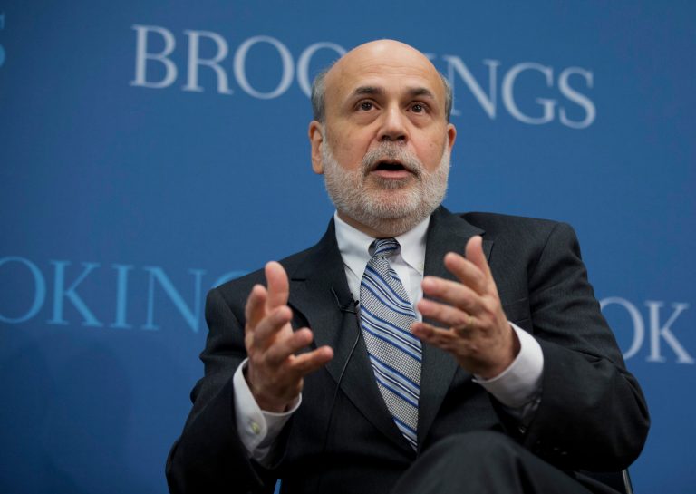 FILE - This Jan. 16, 2014 file photo shows outgoing Federal Reserve Chairman Ben Bernanke speaking at the Brookings Institution in Washington. Bernanke has an agreement with W.W. Norton & Company for a book that will cover his years at the Fed and his response to the economic crisis of 2008. Norton announced Tuesday, May 6, that the book, currently untitled, is scheduled for 2015. (AP Photo/Manuel Balce Ceneta, File)