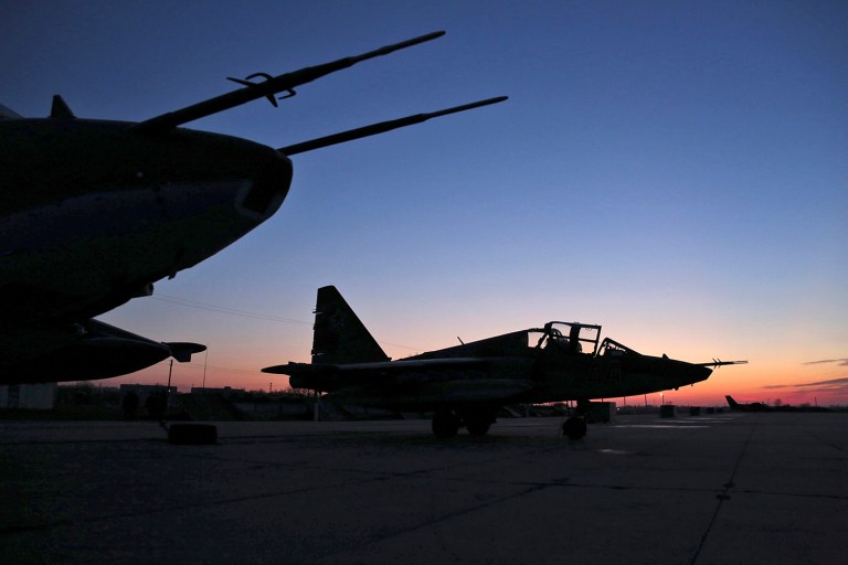 Harrigian said the U.S. stays in close communication with the Russians to ensure they know where the coalition airplanes are bombing, but doesn't coordinate or seek permission in carrying out air attacks. (Olga Balashova/Russian Defense Ministry Press Service via AP)