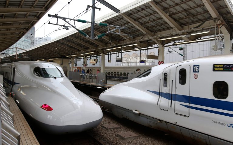 In this Sept. 24, 2014 photo, a Shinkansen bullet train arrives at Tokyo Station in Tokyo. Japan launched its bullet train between Tokyo and Osaka 50 years ago Wednesday, Oct. 1, 2014.(AP Photo/Shizuo Kambayashi)