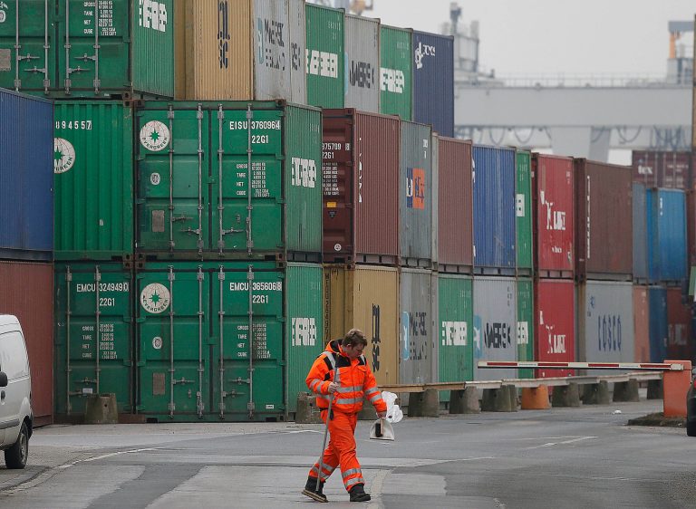 FILE - The Feb. 14, 2013 file photo shows containers piled up at the Duisburg harbour, Germany. German exports plunged in August as increasing uncertainty over the crisis in Ukraine and the timing of summer holidays combined to produce the largest drop in five years. The Federal Statistical Office reported Thursday, Oct. 9, 2014 that August exports dropped 5.8 percent over July while imports dropped 1.3 percent in calendar and seasonally adjusted terms. The country's trade surplus narrowed to an unadjusted 14.1 billion euros (US$17.83 billion).  (AP Photo/Frank Augstein, file)