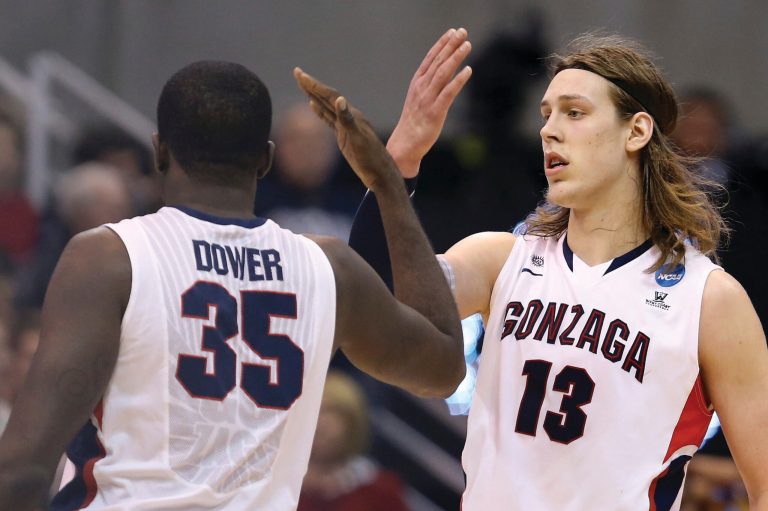 Streeter Lecka/Getty Images
Kelly Olynyk #13 and Sam Dower #35 of the Gonzaga Bulldogs celebrate late in the second half while taking on the Southern University Jaguars