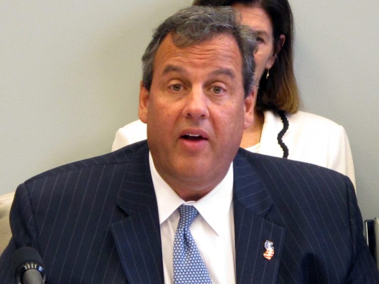 New Jersey Gov. Chris Christie speaks at a meeting in Atlantic City N.J.  that he convened on Monday Sept. 8, 2014 about the future of Atlantic City. The meeting with elected officials and casino executives came hours after Christie's administration said it would allow the state's casinos and horse tracks to immediately begin offering sports betting, a move assumed to be challenged in court by the major professional and collegiate sports leagues. (AP Photo/Wayne Parry)