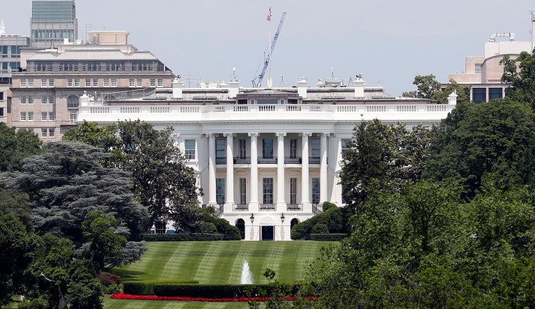 A report indicates that 30 aides' interim clearances will be downgraded to secret level to align with White House chief of staff John Kelly's new policy of not permitting temporary clearances at a top secret or sensitive compartmented information level. (AP Photo/Alex Brandon)