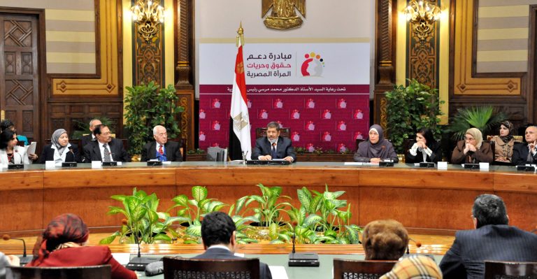 In this image released by the Egyptian Presidency, Egyptian President Mohammed Morsi speaks at a conference on women's rights held at the Presidential palace in Cairo, Egypt, Sunday March 24, 2013. Egypt's president delivered a stern warning to his opponents on Sunday, saying he may be close to taking unspecified measures to 