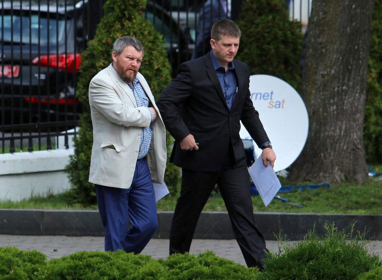 Pro-Russian rebel leaders from Eastern Ukraine Andrei Purgin, left, and Alexey Karyakin  walk in Minsk, Belarus, on Monday, Sept. 1, 2014. A so-called contact group meets for talks in Minsk, the Belarusian capital, to reach agreement on a cease-fire. The group, which last met in late July, includes representatives of Ukraine, Russia and the Organization for Security and Cooperation in Europe. (AP Photo/Dmitry Brushko)