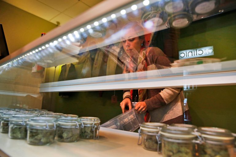 The Clinic, a Denver-based dispensary with several outlets, is among the roughly 150 medical marijuana dispensaries hoping to begin selling to recreational users when it becomes legal to sell on Jan. 1, 2014. (AP/Brennan Linsley)