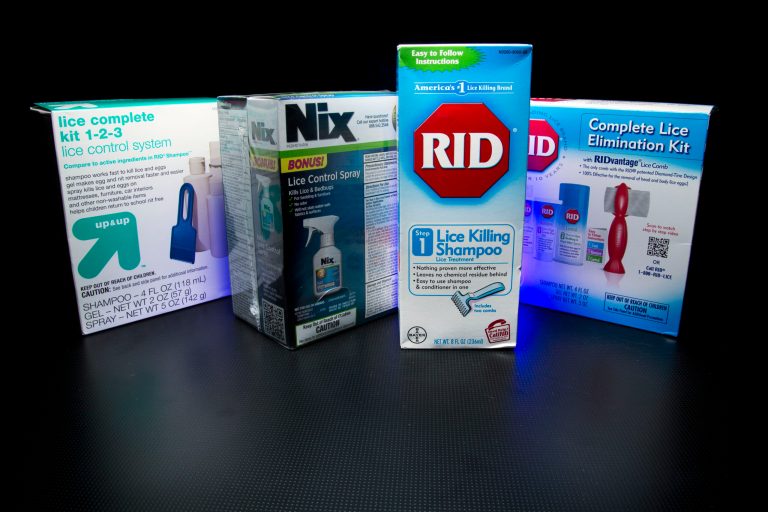 Over the counter products for controlling head lice are photographed in Washington, Monday, Nov. 4, 2013. Some parents are scratching their heads over less restrictive head lice policies that allow children with live bugs in their hair to return to the classroom for the rest of the day. Some school nurses are no longer sending home 