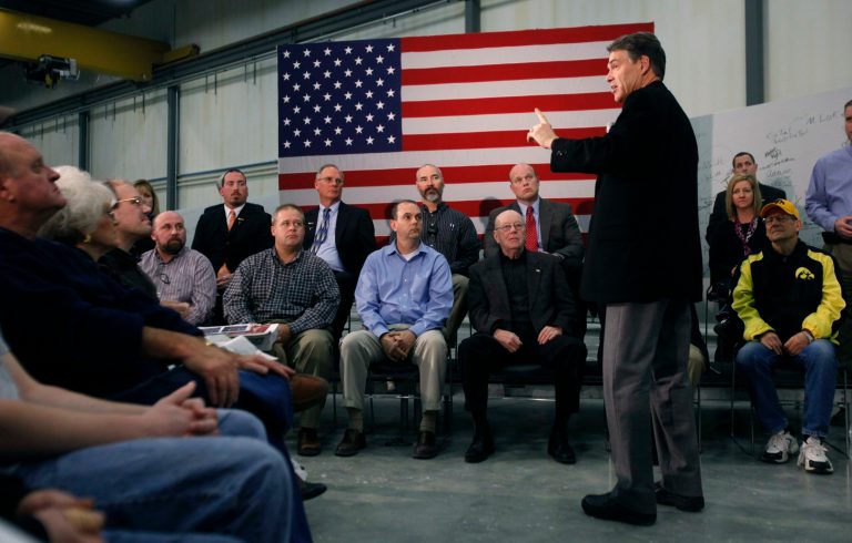Iowa political ad spending surges as caucus nears