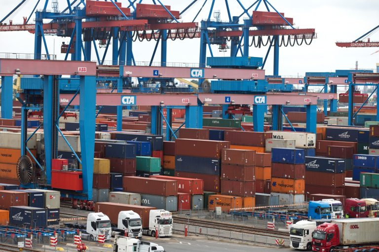 FILE - The June 16, 2014 file photo shows containers in the Hamburg, northern Germany, harbour. The shaky economic recovery in the 18-country eurozone ground to a halt in the second quarter amid fears over the crisis in Ukraine and softer trade and investment. The main reasons behind the flat outcome was a 0.2 percent quarterly decline in Germany, Europe's biggest economy, Eurostat reported Thursday, Aug. 14, 2014.  (AP Photo/dpa, Christian Charisius)