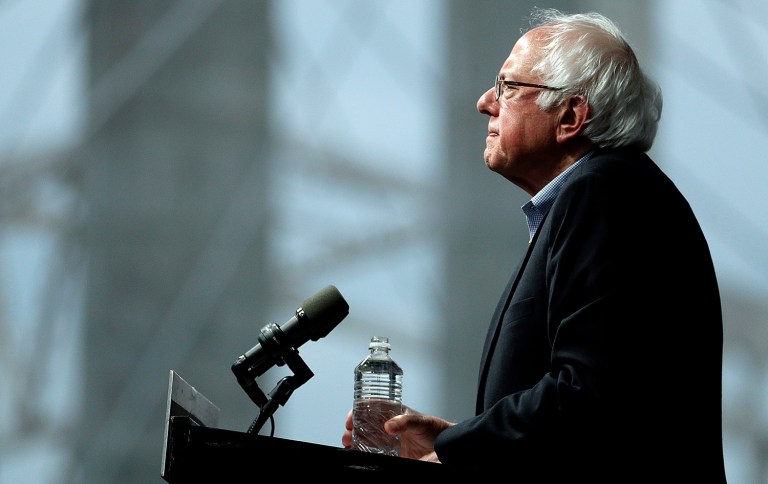 To fund universal healthcare, Sanders is proposing a 6.2 percent payroll tax and 2.2 percent income surtax on taxable income. (AP Photo/Charlie Riedel)