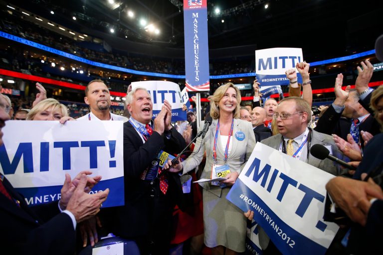 Massachusetts delegates cheer as Mitt Romney is nominated for the Office of the President of the United States at the Republican National Convention in Tampa, Fla., on Tuesday, Aug. 28, 2012. (AP Photo/Jae C. Hong)