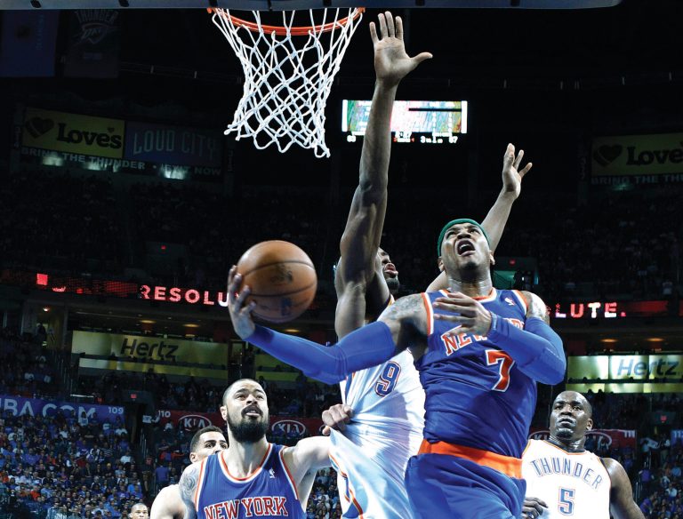 Sue Ogrocki/AP
Carmelo Anthony finished with 36 points and 12 rebounds for the Knicks on Sunday.