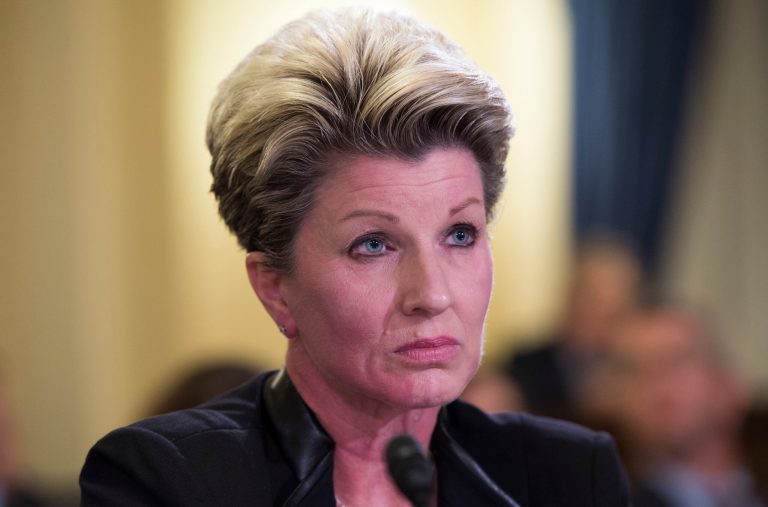 Kimberly Graves, former head of a VA regional office in Minnesota, appeared before the Merit Systems Protection Board Wednesday to appeal the VA's decision to strip her of her title. (AP Photo/Molly Riley, File)