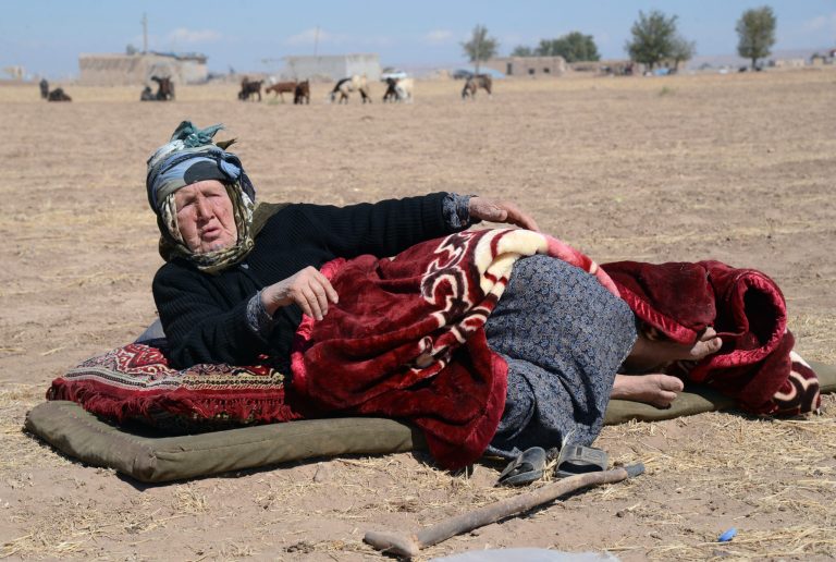 A Syrian Kurdish refugee woman at the border in Suruc, Turkey, Saturday, Sept. 20, 2014. Several thousand Syrians, most of them Kurds, crossed into Turkey on Friday to find refuge from Islamic State militants who have barreled through dozens of Kurdish villages in northern Syria in the past 48 hours. (AP Photo)