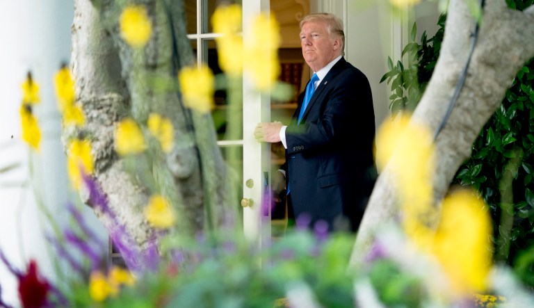 President Donald Trump leaves the Oval office to board Marine One on the South Lawn of the White House in Washington, Wednesday, Oct. 25, 2017, for a short trip to Andrews Air Force Base, Md. and then on to Dallas. (AP Photo/Andrew Harnik)